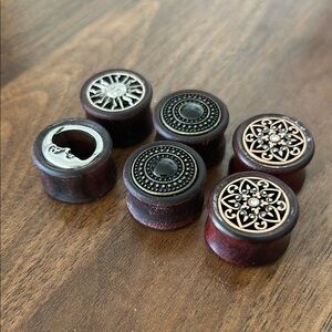Set of Decorative Wooden Plugs with Metal Accents